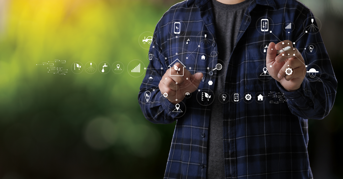 Uomo in camicia con simboli tecnologia 